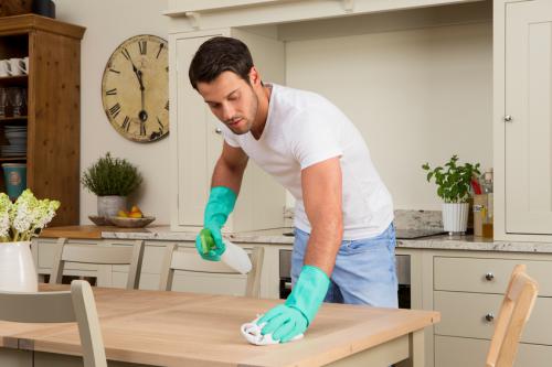 Male Cleaning the Kitchen
